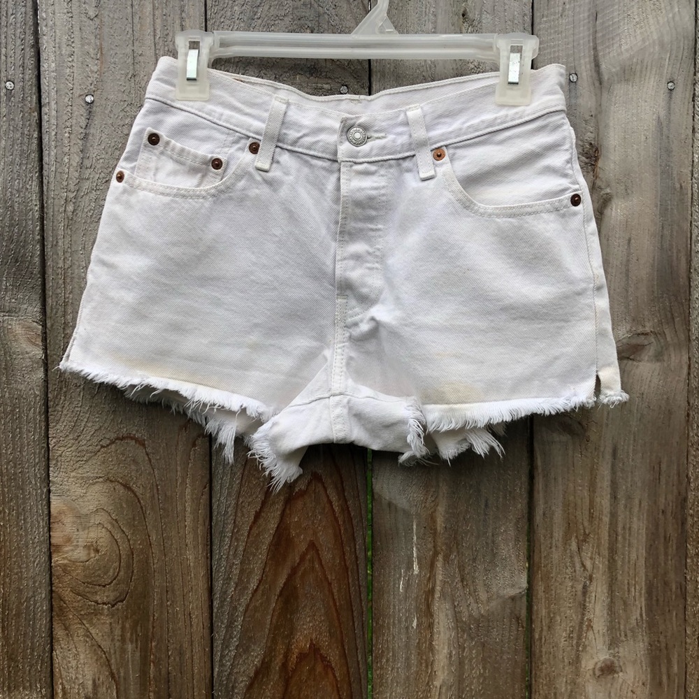White Levi’s raw hemmed shorts